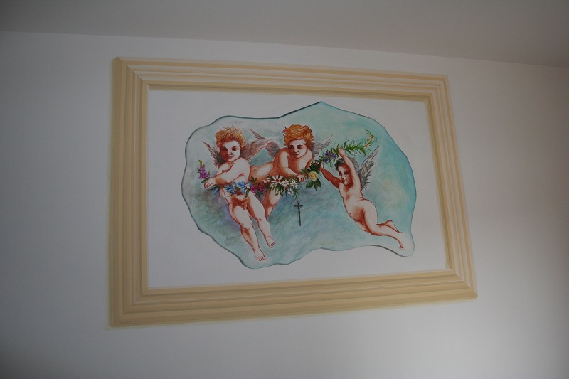 finta-cornice-racchiude-decorazione-esistente